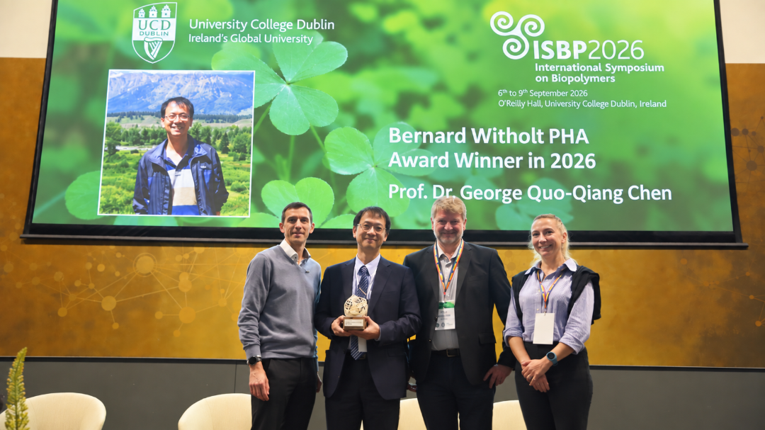 Conference presentation and group photograph at the Bernard Witholt PHA Award event.
